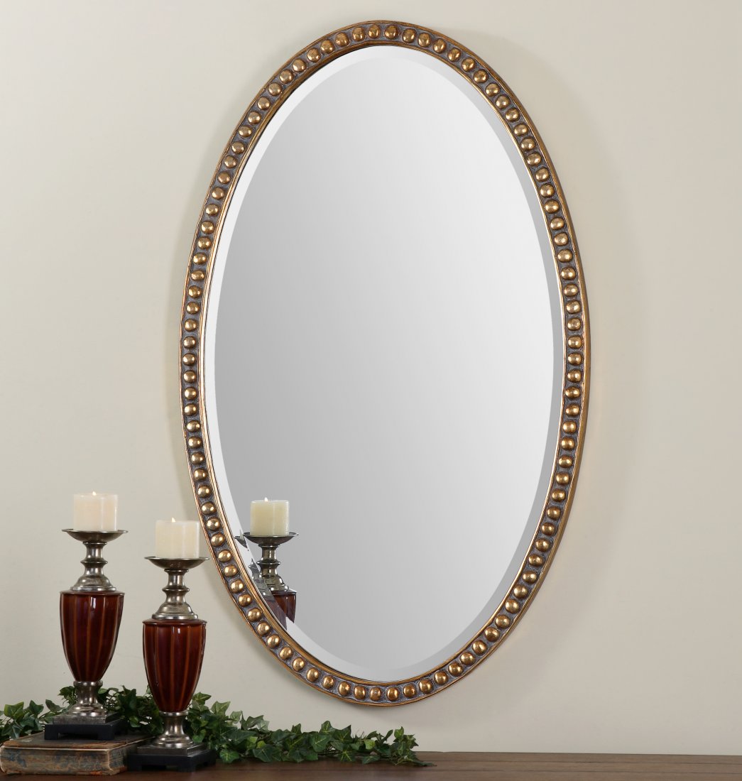 BEADEL OVAL MIRRORS: BEADEL OVAL MIRRORS - LIGHTLY ANTIQUED GOLD LEAF ACCENTED WITH A GRAY WASH. - THIS OVERSIZED, OVAL MIRROR FEATURES A BEADED FRAME WITH A LIGHTLY ANTIQUED, GOLD LEAF FINISH AND A GRAY WASH. MIRROR HAS