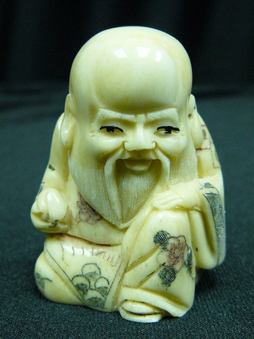 2" BONE NETSUKE: 2" Bone Netsuke - 1"x1.5"x2" - This Is A Very Beautifully Carved Netsuke. All Hand Carved From One Solid Piece Of Solid Bone. Hand Painted With Signature On The Bottom. There Are 2 Holes On The Back, 