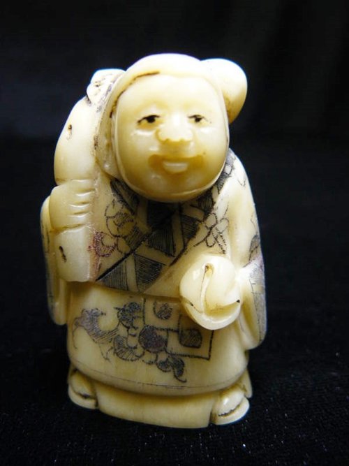 BONE NETSUKE: Bone Netsuke - Long: 1.5", Deep: 1", High: 2" - This Is A Very Beautifully Carved Netsuke. All Hand Carved From One Solid Piece Of Solid Bone. Hand Painted With Signature On The Bottom. There Are 2 Ho