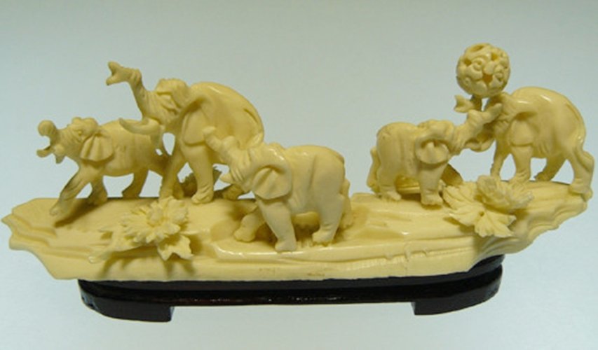 BONE ELEPHANTS JUNGLE: Bone Elephants Jungle - Long: 4.5", Wide: 1.5", High: 2" - This Elephants Jungle Is Made From Solid Bones. All Natural And All Hand Carved From Solid Bone. It Is Not Bone Powder, Resin Or Mouded. Very