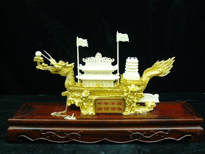 BONE GOLDEN DRAGON BOAT WITH CASE: Bone Golden Dragon Boat With Case - Size Without Case: Long 10", Deep 2", High 6". Size With Case: Long 15", Deep 4", High 10". - This Beautiful Artwork Is Made From Natural Water Buffalo Bone. All Ha