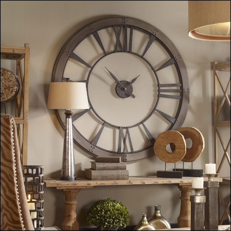 RONAN WALL CLOCK, LARGE: RONAN WALL CLOCK, LARGE - DARK RUSTIC BRONZE ACCENTED WITH A RUST GRAY FRAME. - DARK, RUSTIC BRONZE FINISH ACCENTED WITH A RUST GRAY FRAME. QUARTZ MOVEMENT. MATERIAL: MDF/METAL OVERALL DEPTH IN INCHES