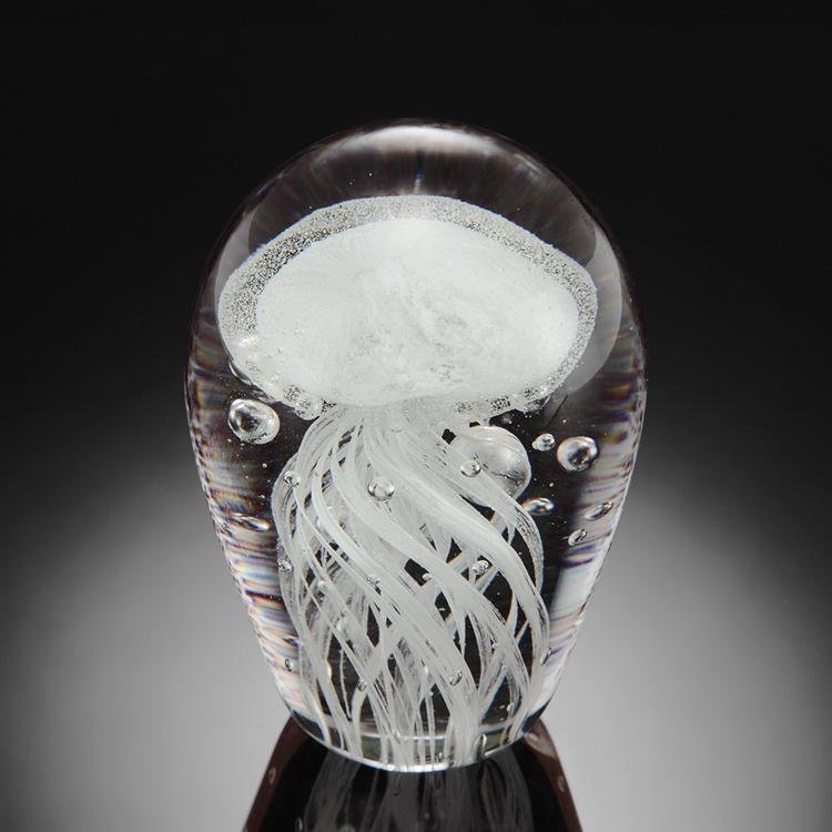 Art Glass Purple Jellyfish Glow In The Dark: Art Glass Purple Jellyfish Glow In The Dark - Dimensions: 4"h 3"w 3"d Material: Glass Weight: 1.7lbs