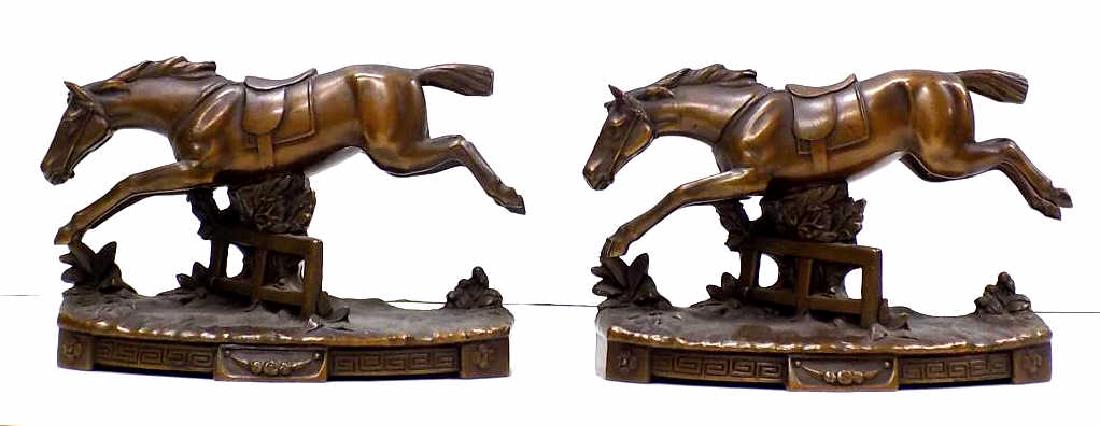 JENNINGS BROTHERS BRONZED HORSE BOOK ENDS Pair Jennings: Pair Jennings Brothers Bronzed Leaping Horse Bookends. Each marked JB 3012 rear. H 4 1/2" x L 7". Warm patina.