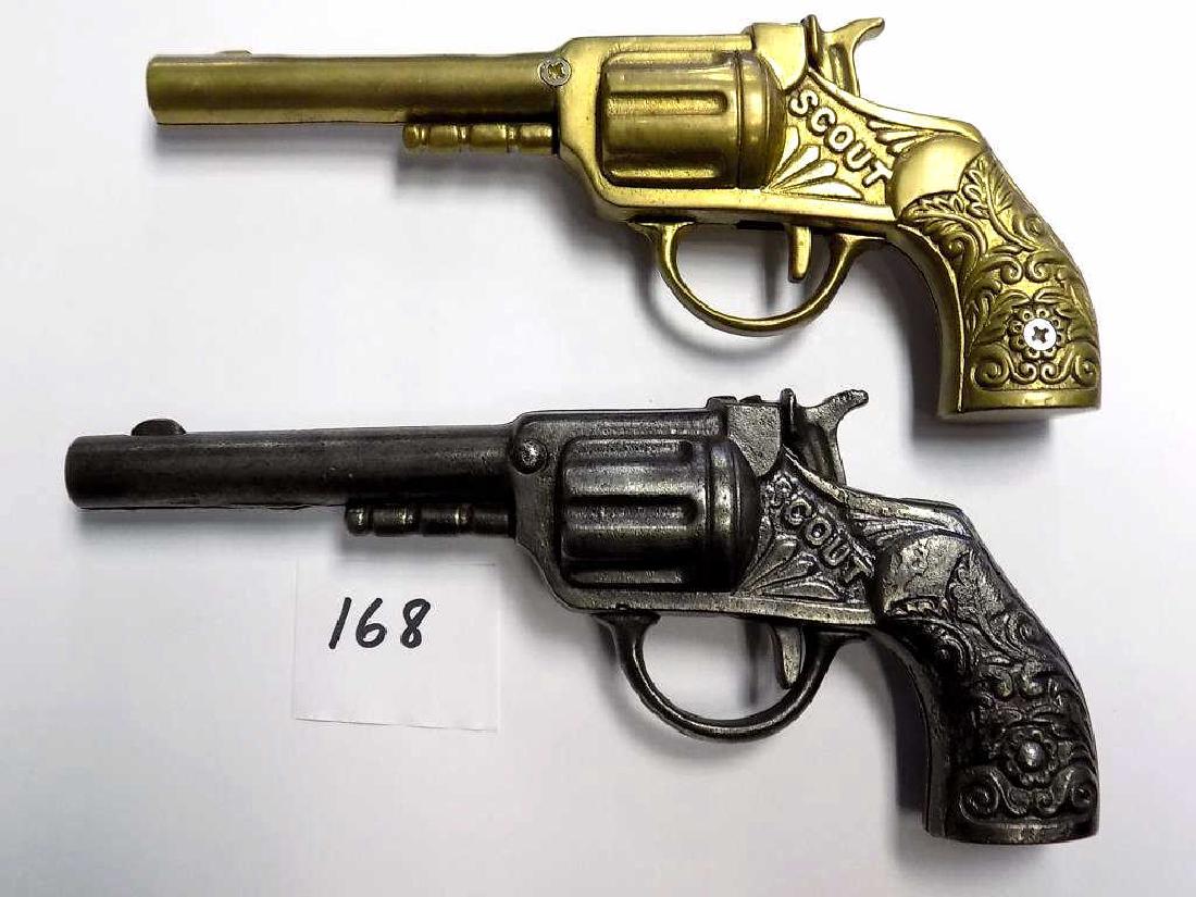 1890 STEVENS SCOUT CAST IRON CAP GUN PISTOLS 2 1890: 2 1890 Stevens Scout Cast Iron cap gun pistols. Patented Jun 17, 1890. First in Brass, Second in Nickel Silver (worn finish patenized). Each with Fancy ornate scrollwork casting. Length 7". Both in wo