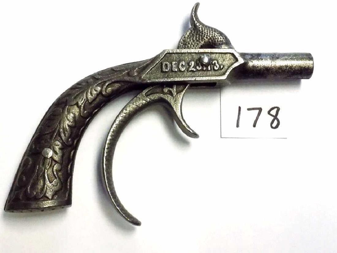 RARE STEVENS 1873 CAST IRON CAP GUN PISTOL Rare Stevens: Rare Stevens 1873 Cast Iron cap gun pistol with Long curved double trigger. Fancy cast scrolled acanthus with cross hatching and stylized curved hammer. Working order, nice patina. Length 5". Dated De