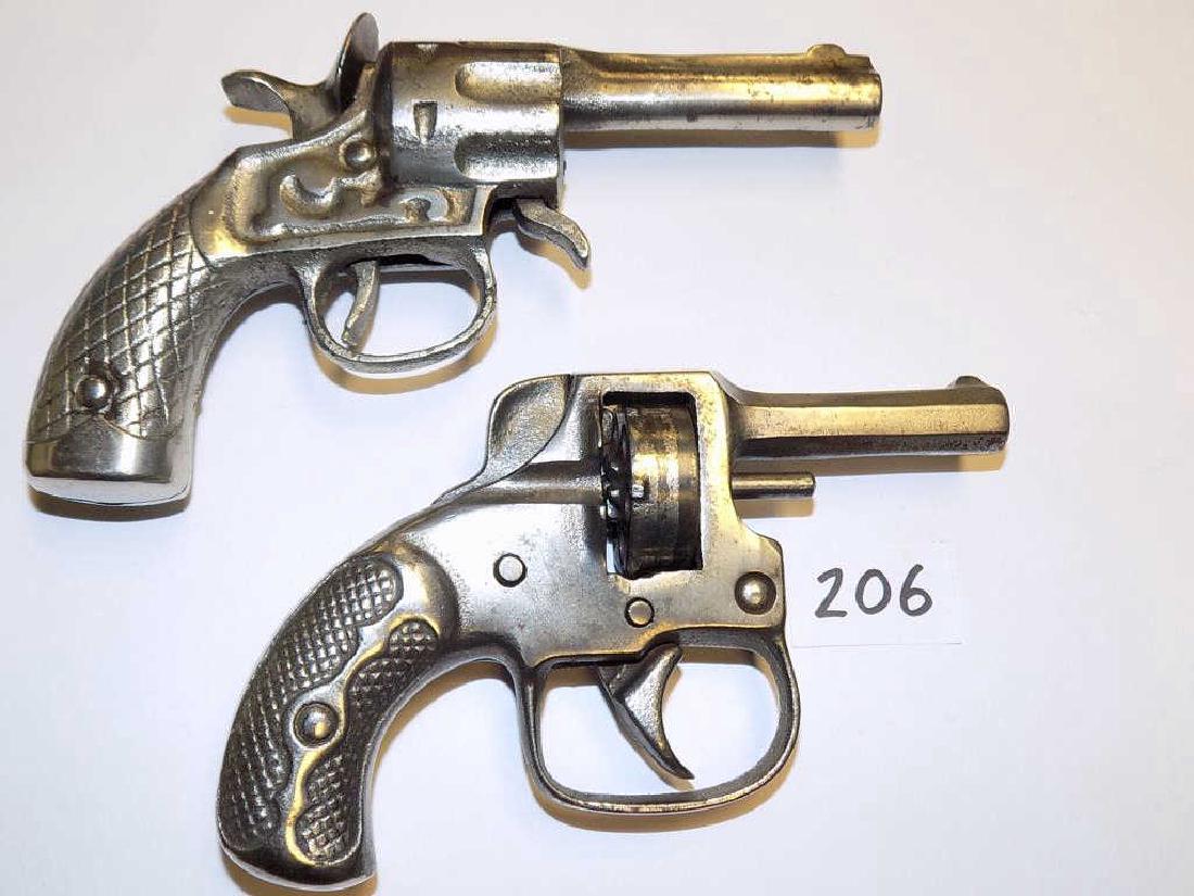 KEATON NICKEL CAST IRON CAP GUN PISTOL Keaton 1907: Keaton 1907 Nickel Silver plated Cast Iron .22 Cal Blank gun cap pistol with 2nd trigger located under barrel. Unmarked, Rated 3 Stars Cast Iron Toy Guns & Capshooters book. Along with Nickel Silver p