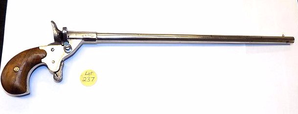 GERMAN PARLOR EXTRA LONG BARREL STARTER GUN PISTOL: Antique German Parlor Starter gun pistol with Extra Long barrel. Unknown maker crown maker marks with letters BG & U. Chrome finish with wooden grips. Working order. Length 13 1/4"