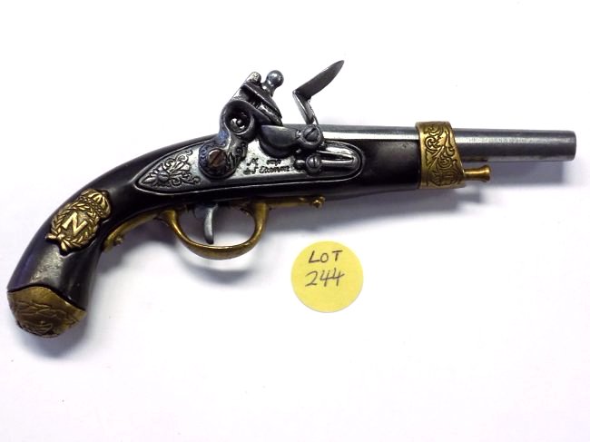 NAPOLEONIC STYLE MINIATURE CAP GUN PISTOL: French Napoleonic style miniature flint lock persussion pistol cap gun. Cast Iron with Bronze mounts. Working order. Length 6"
