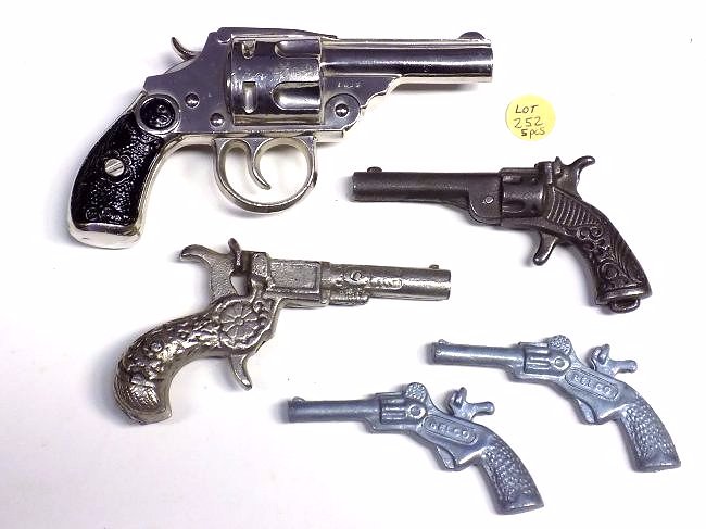 GROUP OF CAST IRON CAP GUN REPLICAS: Group of 5 Cast Iron Cap gun pistol replicas including a Chrome finish E & JB Revolver Length 6"