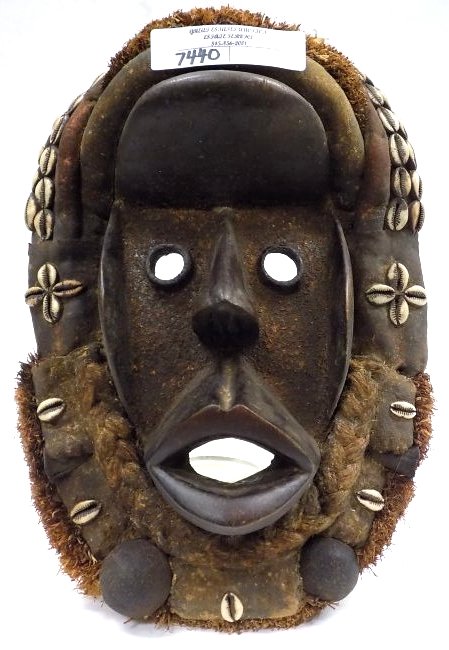 EARLY AFRICAN DAN TRIBE MASK: Antique African Carved Dan Tribe Ritual Mask with Conch shells and inset bells used in ceremonies. 10" x 15".