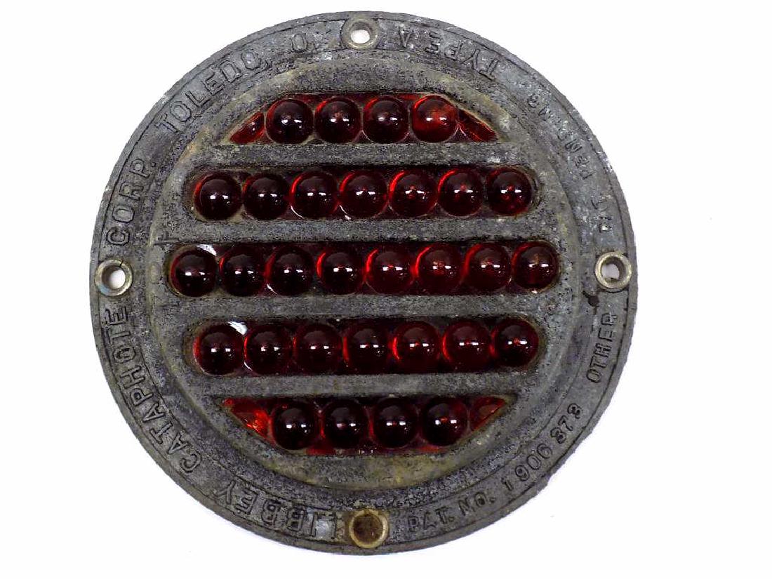 LIBBEY CATAPHOTE CORP 1930'S AUTOMOBILE REFLECTOR: Circa 1930's 1940's Libbey Cataphote Corp Toledo Ohio Type A Cataphote Automobile or Train Reflector with Red Glass. 5" Diameter.