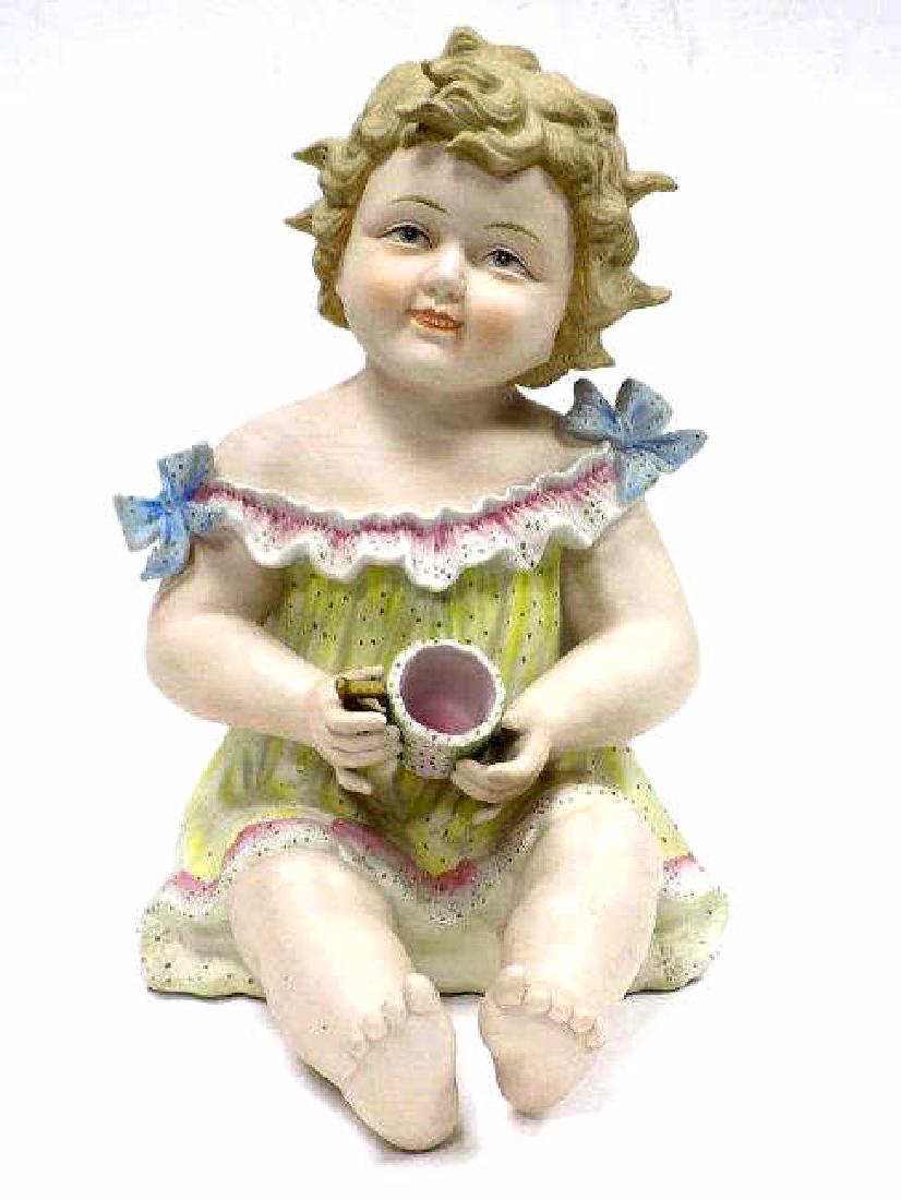 VICTORIAN PIANO BABY WITH CUP FIGURE (1 of 2)