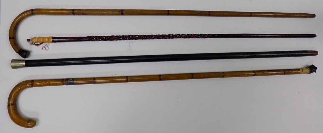GROUP OF 4 UNUSUAL WALKING STICKS: Antique Group of 4 Unusual Walking Sticks Including: Bamboo with Silver Band, Bamboo with Bakelite End, Turkish Walking Stick with Bone Handle and Braided Carved Design, Silver Capped Ebony.