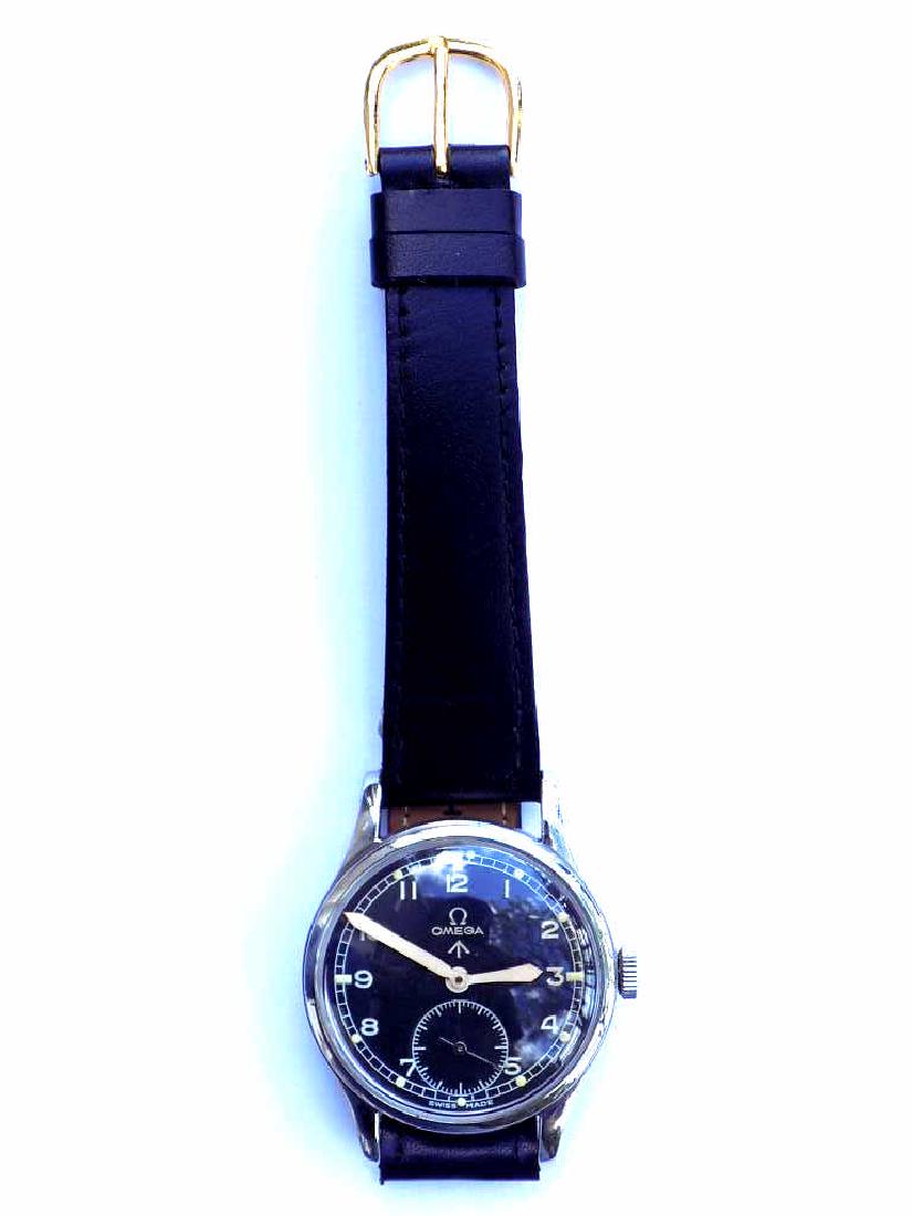 OMEGA WWW WORLD WAR II MILITARY WRISTWATCH: Rare Dirty Dozen OMEGA WWW World War II British Military Issued Wristwatch. 15 Jewel Swiss Movement. Silver Chrome Steel Case. Black Face with Separate Seconds Dial and Glow in the Dark Markers. 35mm 