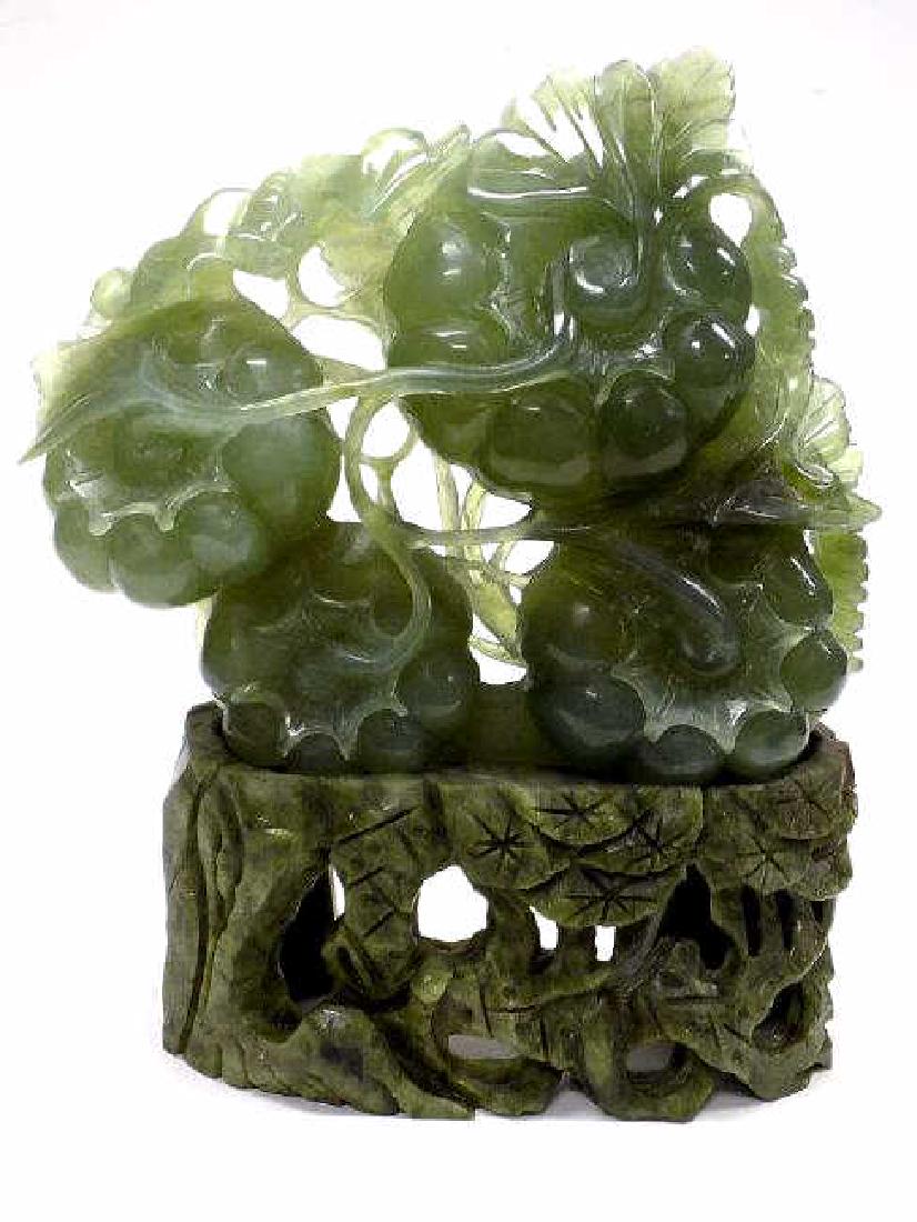 CHINESE JADE BAT & PUMPKINS CARVING WITH STAND: Chinese Jade Carving of a Bat Flying over Vined Pumpkins Symbolizing Wealth, Longevity, Peace, Good Health, Prosperity and Abundance. Height 8" x 7" With Lotus Carved Hardstone Stand.