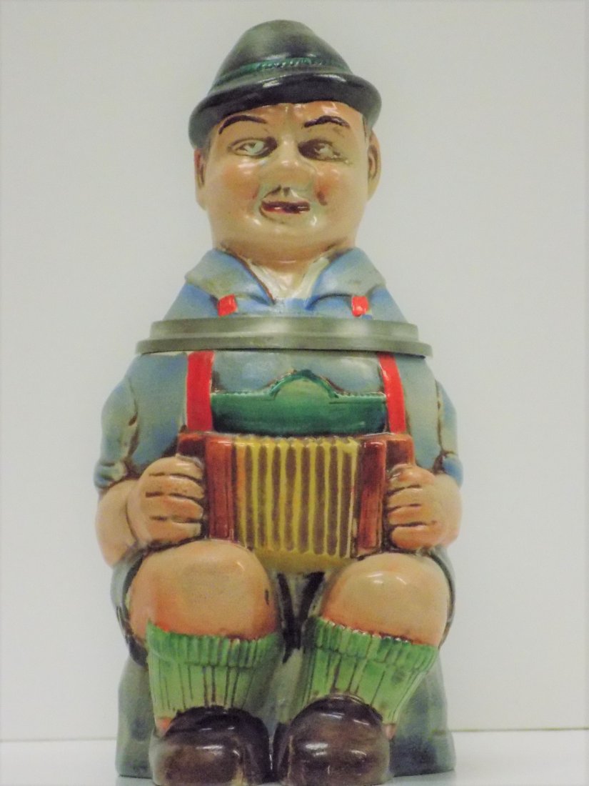 GERMAN ACCORDION PLAYER CHARACTER BEER STEIN: Goebel German Accordion Player Character Beer Stein. Numbered Base. Height 9'