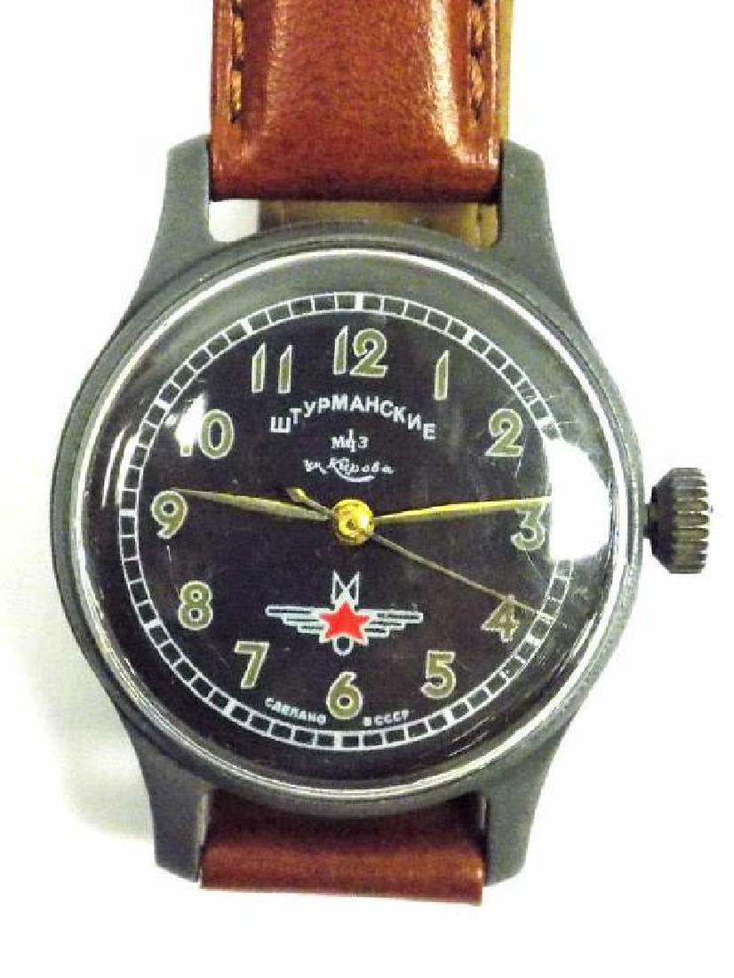 RUSSIAN MILITARY ISSUED ARIEL RECON WRISTWATCH: Russian Military Issued Ariel Recon Wristwatch. Russian Issue Specs on rear. Soviet Red Star with Wings Insignia. Steel Case with Brown Leather Strap. Working Order.