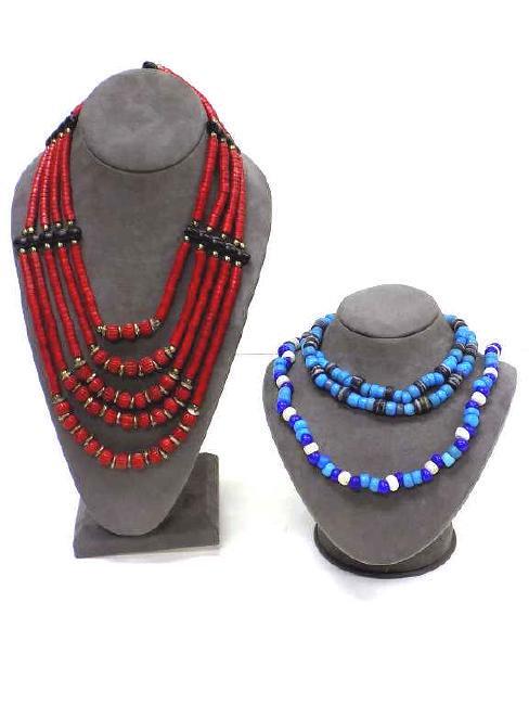 3 NATIVE AMERICAN INDIAN BEADED TRADE NECKLACES: 3 Early 20th Century Native American Indian Beaded Trade Necklaces including: Red Dyed Bone, Metal and Wood Beaded Breast Plate 5 Strand Choker. Along with 2 Multi Blue and Stone Bead Trade Necklaces.