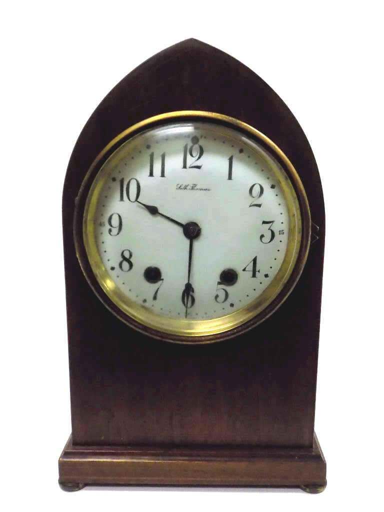 SETH THOMAS ARTS & CRAFTS CATHEDRAL INLAID CHIME CLOCK: Seth Thomas Cathedral shape Chime Clock. Mahogany Wood with Artis & Crafts Inlay Design. Original Crystal, Brass Works, Pendulum and Feet. 7" x 12"