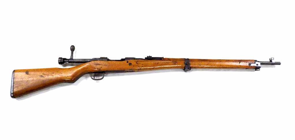 WWII JAPANESE ARISAKA TYPE 99 BOLT ACTION RIFLE: World War II Japanese Arisaka Short Type 99 Bolt Action Rifle. Lifting Sight. Wood body and Stock with Aircraft dust cover. Length 44.25". Brought back from the War. NICS Check required.