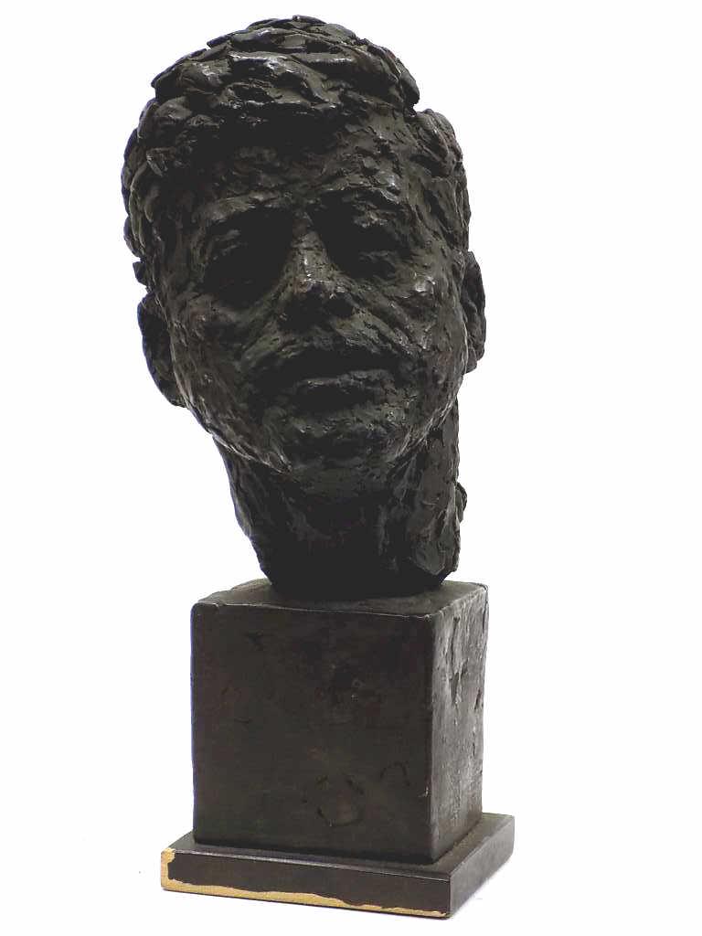 JFK JOHN FITZGERALD KENNEDY SCULPTED BUST: Circa 1960's JFK John Fitzgerald Kennedy Sculpted Bust. Green Bronzed Coated Plaster. Illegibly Signed. Total Height Approximately 9"