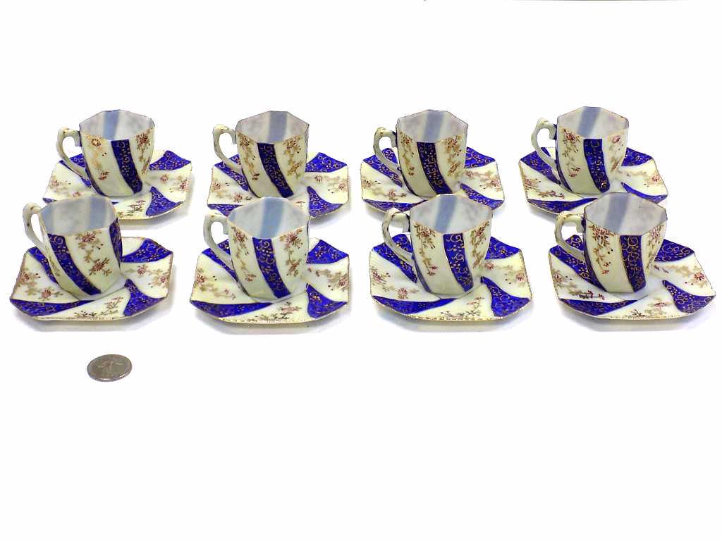JAPANESE DEMITASSE PORCELAIN TEA SERVICE FOR 8: Circa 1910 Japanese Demitasse Porcelain Tea Cup and Saucer Service for 8. Cobalt Blue with Gold Floral Decoration. Signed.