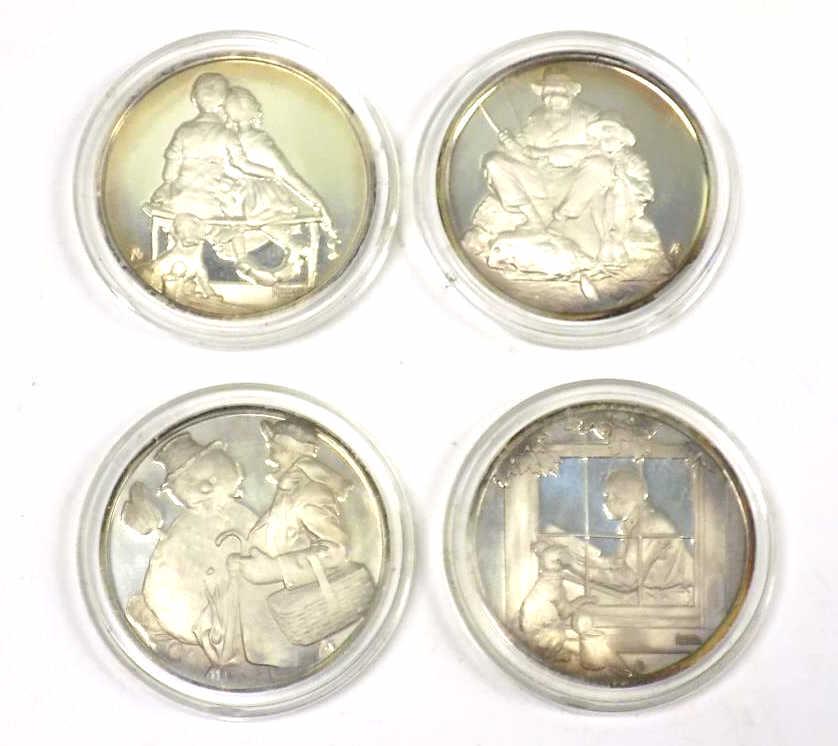 NORMAN ROCKWELL FOUR SEASONS SILVER PROOF SET: Norman Rockwell The Four Seasons Silver Proof Coin Set. Produced by the Hamilton Mint. Spring, Summer, Autumn, Winter. Sealed Capsules. 4 Oz
