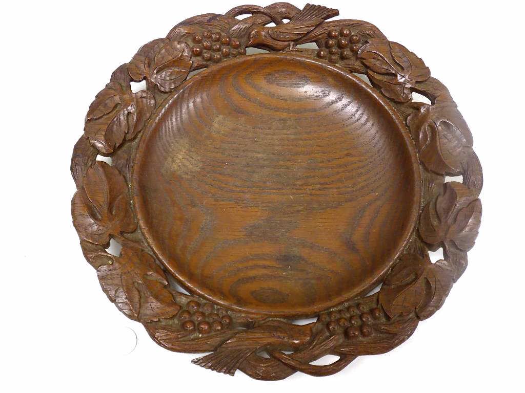 BLACK FOREST CARVED WALNUT WOOD FRUIT BOWL: Antique Black Forest Carved Walnut Wood Fruit Bowl. Border Decorated with Birds and Grapevines. Diameter 14"