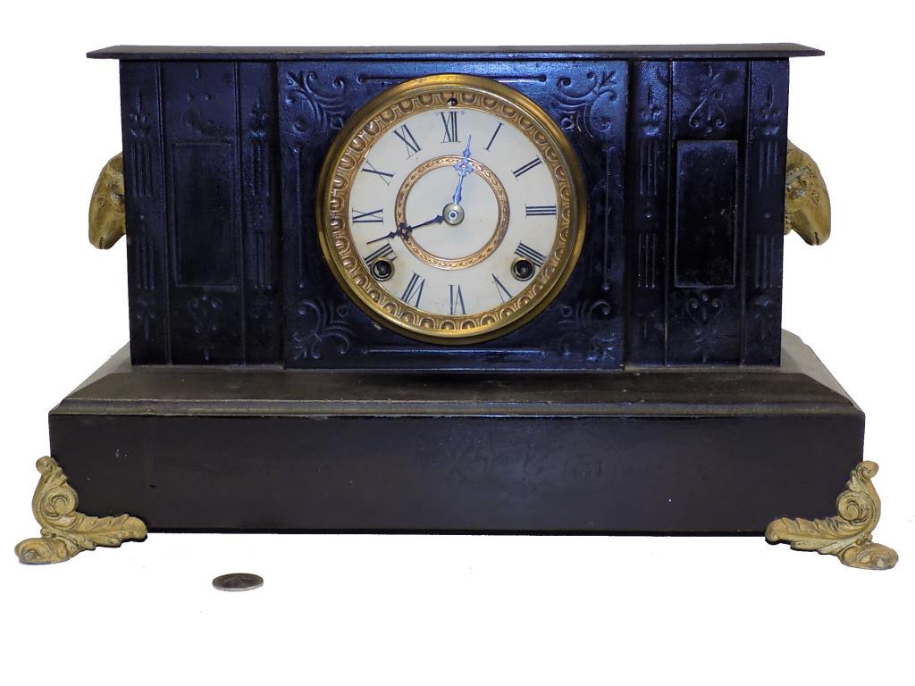 VICTORIAN ANSONIA RAM: Victorian 1880's Ansonia Mantel Clock with Gilt Bronzed Ram's Head Ormolu and Ancanthus Feet. Original Glass Door. Brass works and Pendlum. 9.50" x 7" x 13.50" Working order.