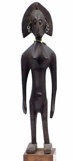 AFRICAN MALI BAMBARA CARVED FIGURAL STATUE: Antique African Mali Bambara Carved ebony Figural Statue with appled jewelry. Height 32" on stand.