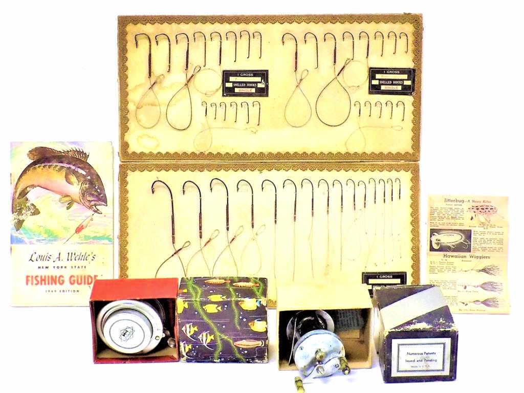 ANTIQUE FISHING ADVERTISING REELS ETC.: Antique Lot of Fishing Related Items. Including: 2 Full Advertising Hook Displays, 1949 New York State Fishing Guide, Boxed Kalamazoo Tackle Co. Atlas Model 1708 Fishing Reel w/ Bakelite Handles, H-I 