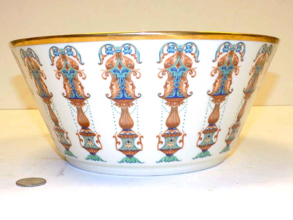 BIG LENOX FOUNTAIN DECORATED PORCELAIN FRUIT BOWL: Big Lenox Porcelain Fruit Bowl. Decorated with Surrounding Fountains. Gold Gilt Rim. Height 4.50" x Diameter 10.50". Signed Base.