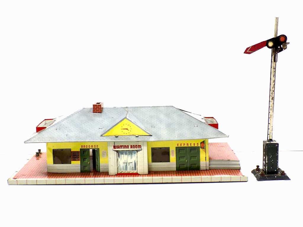 MARX GLENDALE TIN TOY TRAIN STATION W/ IVES SIGNAL: 1950's Marx Glendale Tin Toy Train Station with Ives Signal Tower. 6" x 20.50" Good Condition.