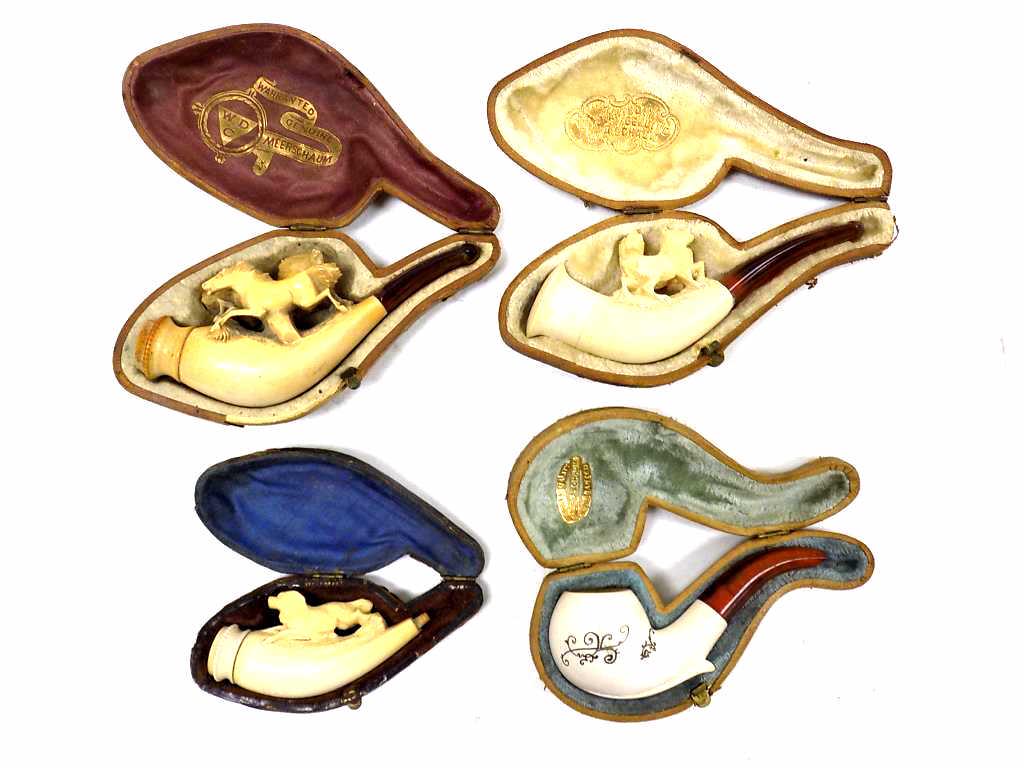 MINIATURE MEERSCHAUM PIPES GROUP: Antique Group of 4 Meerschaum Pipes in Original Leather Cases. Including: Carved Horses (Tip detached) Pair of Scottish Terrier Dogs, Hunting Dog (no tip) Fancy Scroll Decorated (tip issues)