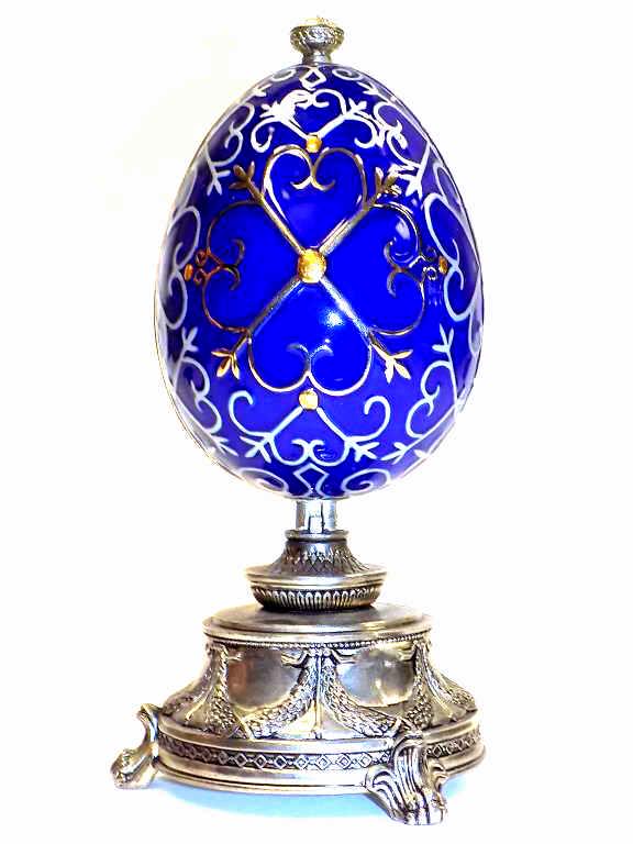 FANCY CAST EGG FORM WATCH HOLDER (1 of 5)