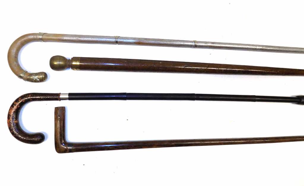 GROUP OF 4 UNUSUAL WALKING STICKS / CANES: Group of 4 Unusual Walking Sticks / Canes. Including Silvered Oak with Metal Mounts, Elm wood with Silver Mount, Portable Black Steel, Brass Top Oak Stick with Hidden Pool Cue.