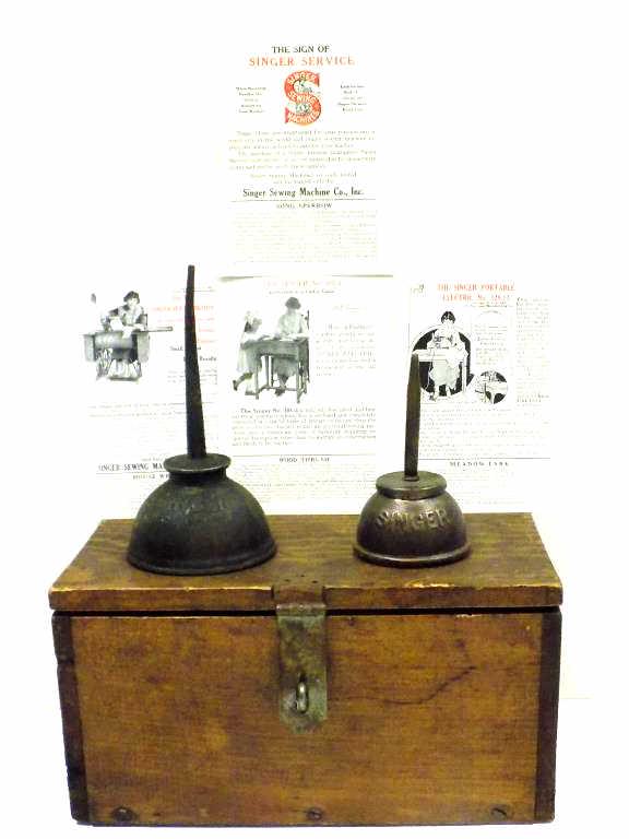 OLD SINGER OIL CANS W/ ADVERTISING PRINTS (1 of 3)