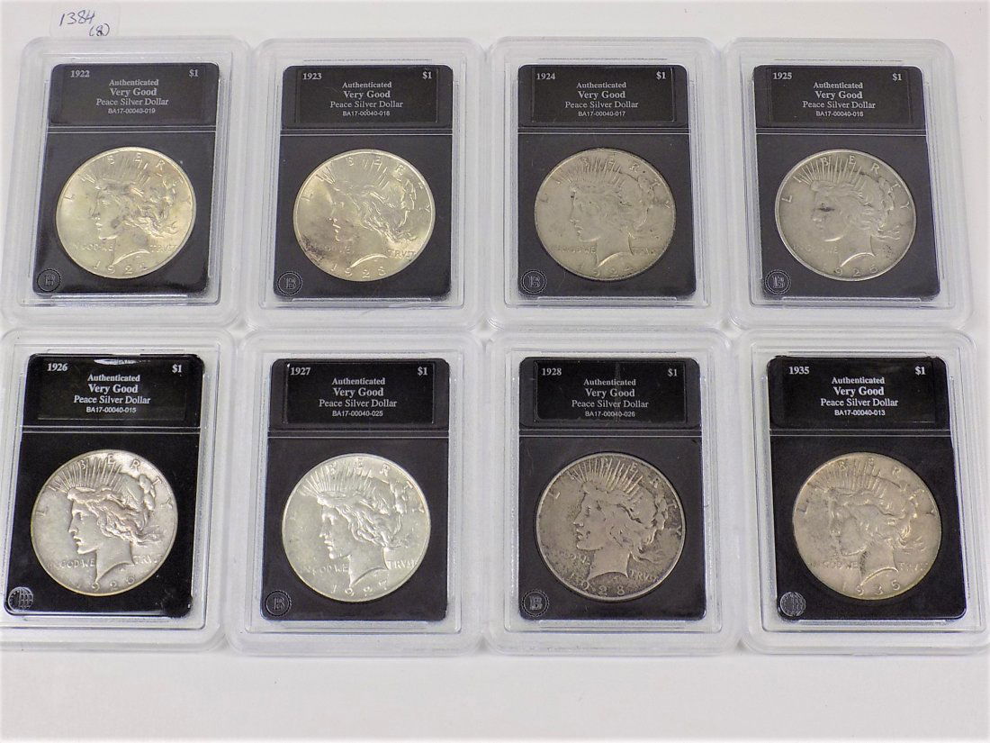 GROUP OF 8 LIBERTY HEAD PEACE SILVER DOLLARS: Group of 8 Liberty Head Peace Silver Dollars. Includes 1922, 1923, 1924, 1925, 1926 S, 1927 D, 1928 S, 1935. All Graded Very Good by The Bradford Exchange.