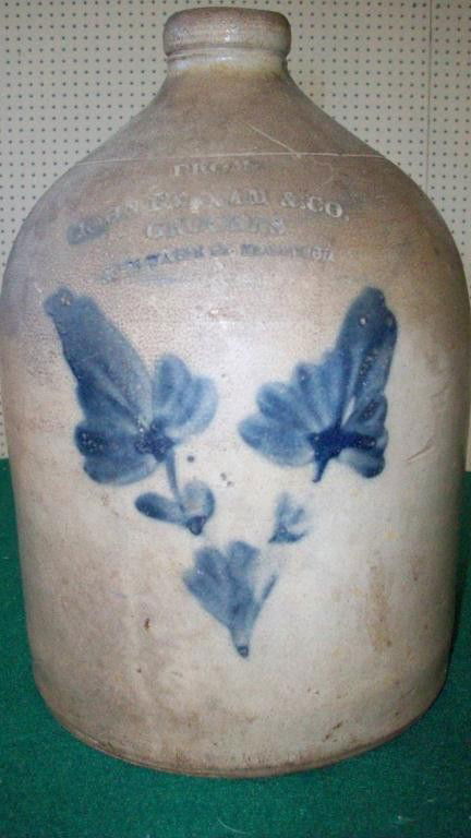 JOHN FARNAM & CO. GROCERS ADVERTISING JUG: Cobalt stylized flowers. ""From John Farnham & Co. Grocers No. 21 Water St. Newburgh"" . Hudson Valley Advertising 19th C. stoneware Jug. 11"" H x 7"" D.