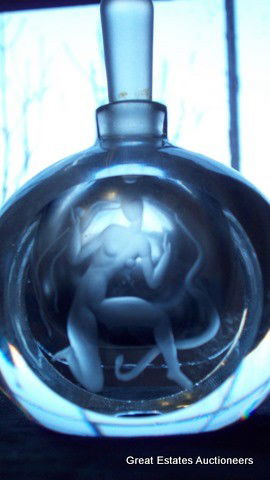 ORREFORS CRYSTAL DECO PERFUME BOTTLE: ORREFORS signed cut crystal glass Art Deco perfume bottle. Etched stylized nude figure. base signed numbered & initialed A.I.P. Original stopper. H 3 1/4"" x L 3 1/4"" x W 2 1/2"".
