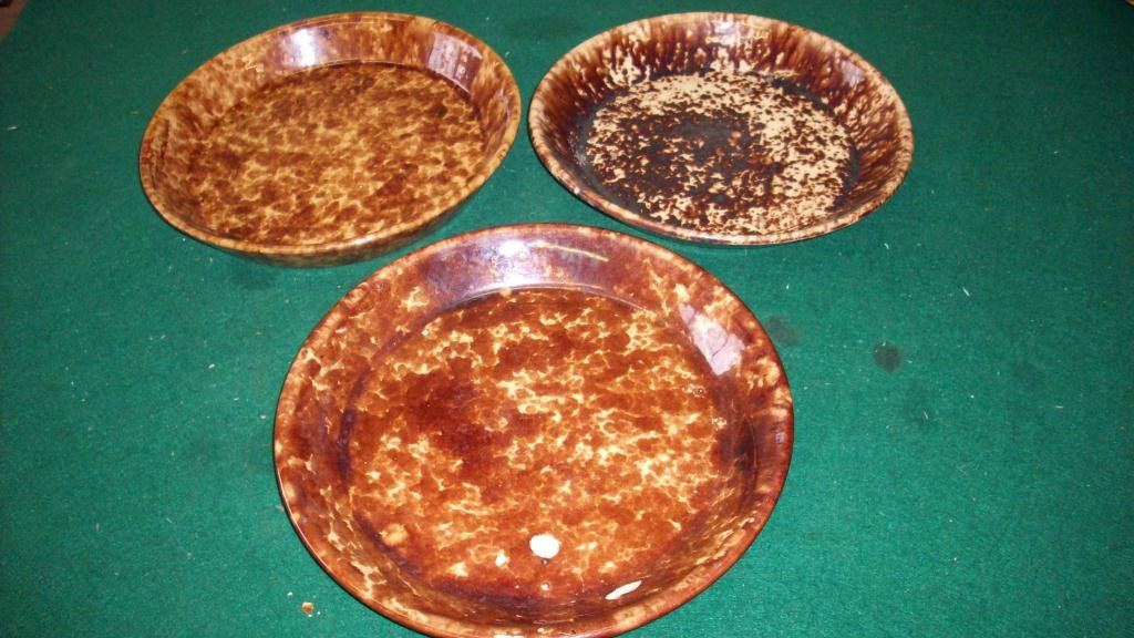 3 19TH CENTURY ROCKINGHAM BOWLS: 3 19th Century Rockingham brown & yellow spatterware bowls. Approx H 1 /2"" x D 10"". Condition: flaking & chips on bowl 1, chips on bowl 2.
