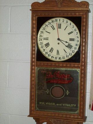 DR. PEPPER ADVERTISING REGULATOR WALL CLOCK: Dr Pepper Advertising tablet regulator wall clock. Gingerbread top & bottom. Original pendulum & key. 20th C. H 39" X L 16".