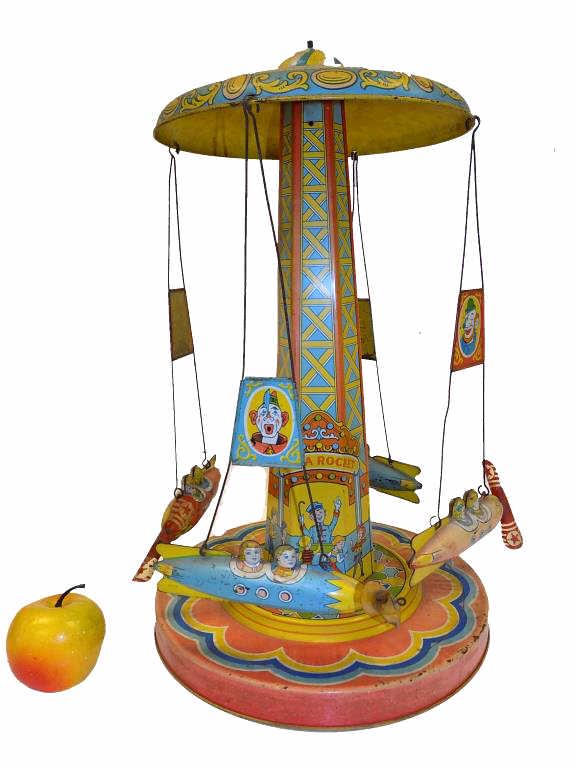 1940'S CHEIN RIDE A ROCKET GO ROUND TIN TOY (1 of 7)