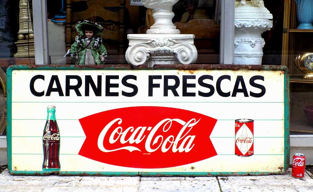 BIG 1950'S COCA COLA STORE ADVERTISING METAL SIGN: Viintage 1950's Coca Cola Metal Advertising Sign. Big Size For a Delicatessen. Reads Carnes Frescas ( Fresh Meat ) with Cocal Cola Bottle, Early Fish Tail Logo, Coca Cola Soda Can. Size 23.50" x 59.25