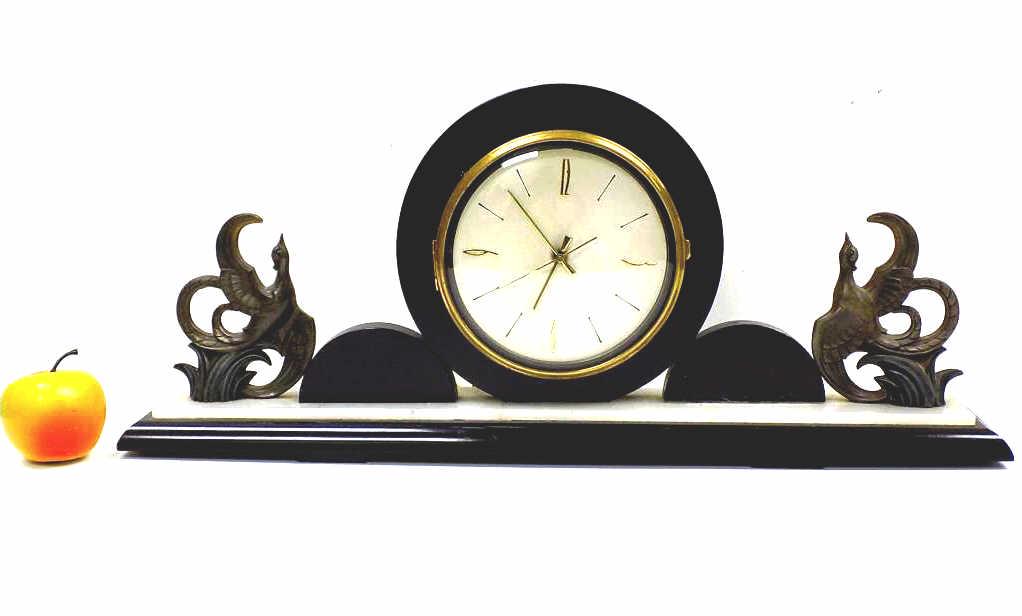 ART DECO DUAL PHOENIX MANTEL CLOCK W/ ONYX: Great Art Deco Mantel Clock with White Onyx. Dual Stylized Metal Side Phoenix. Height 10" x Length 23.50" Working order.