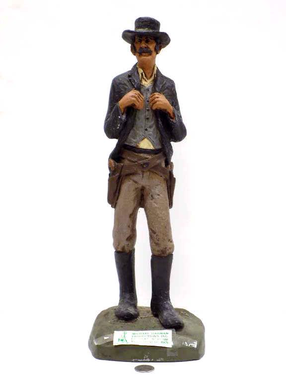 MICHAEL GARMAN - COWBOY SCULPTURE: Michael Garman - American 20th Century - Detailed Sculpture of a Cowboy. Painted Ceramic. Signed Base. Label Included. Height 17"