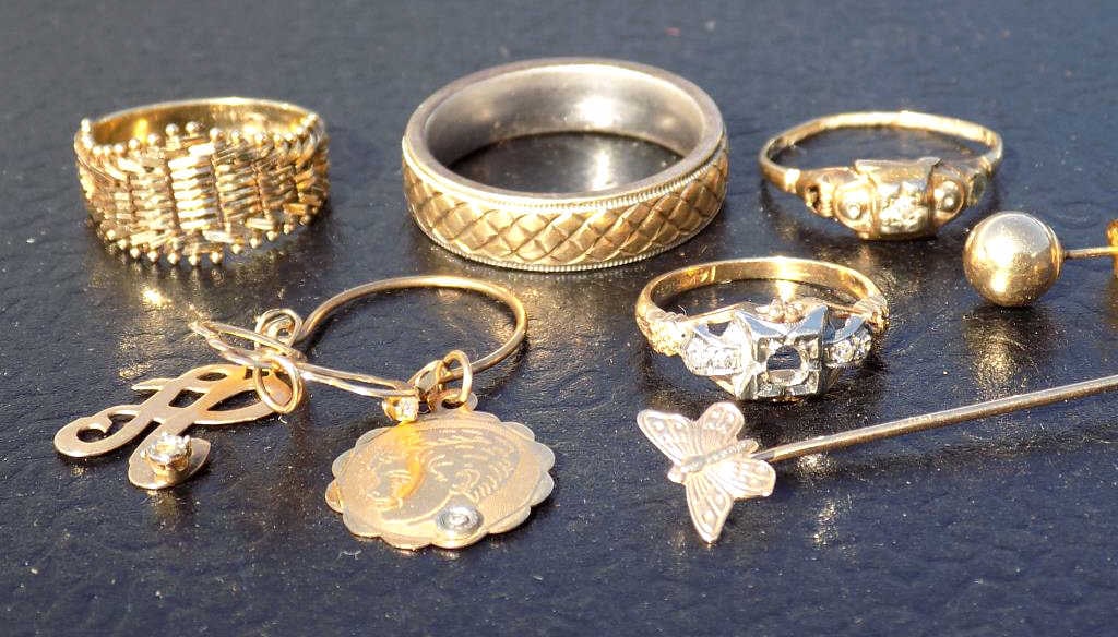 SCRAP GOLD LOT W/ DIAMOND CROSS & RINGS: Mostly 14K Scrap Gold Lot Including Solid & Mesh Ring, Diamond Cross Pendant, 2 Diamond Rings (missing few diamonds) Butterfly Stickpin, 14K Necklace charm with Diamond Chip, Bead Earring, 10k and Ste
