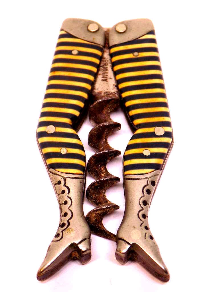 RARE VICTORIAN POCKET CORKSCREW LADIES / LADY LEGS: Rare Victorian Steel & Plastic Ladies / Lady Legs Folding Pocket Corkscrew. Made in Germany. Height 2 1/2 inches Black and Yellow Jacket Stripe Stockings. Very Good condition.