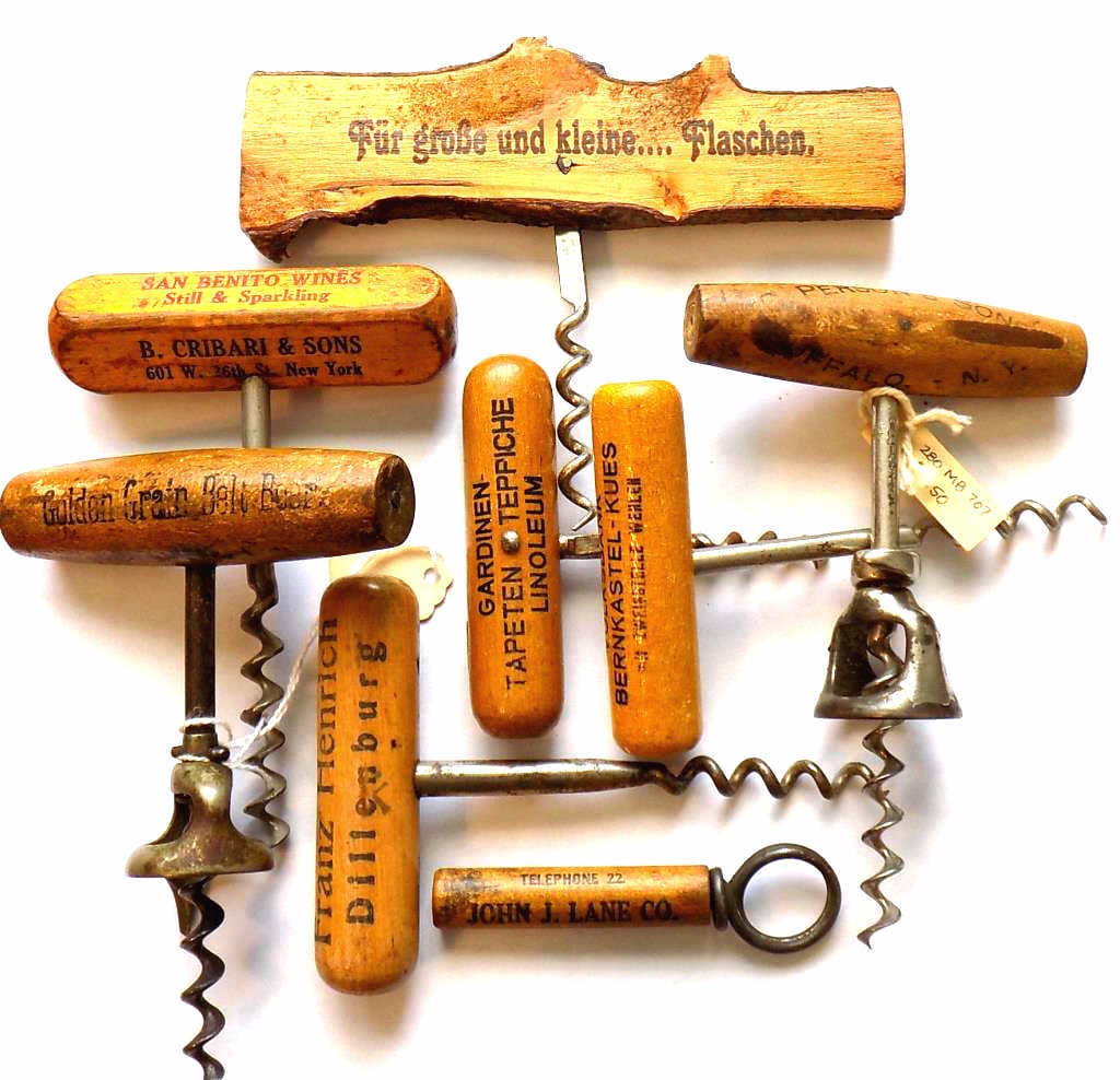 GROUP ADVERTISING CORKSCREWS WOODEN HANDLES: Group Antique Advertising Corkscrews with Wooden Handles. Mostly Circa 1900. Including: Golden Grain Belt Boer Brewing Co., Walkers Patent Auger, C. Person's Sons Buffalo New York Walkers Patent Auger